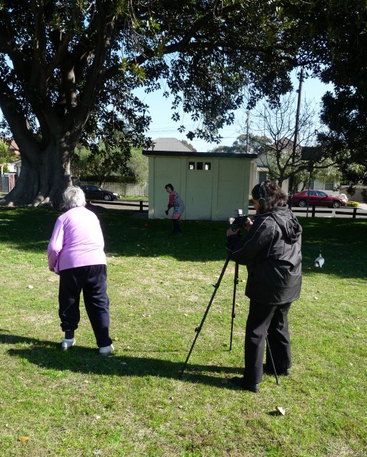 Margaret Slowgrove bowling Vigoro ball to daughter Karen Maber at childhood park, Booralee Park, Botany